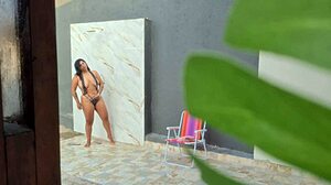 I saw my neighbor washing up in the backyard after she got back from the beach.