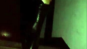 Latex Mistress Dominates Submissive Slave