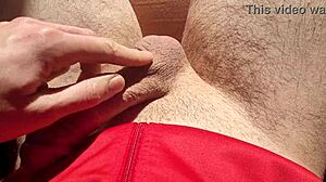 edging from soft to hard, playing with precum in natural light.