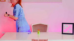 A passionate hentai video featuring a red-haired couple and natural tits