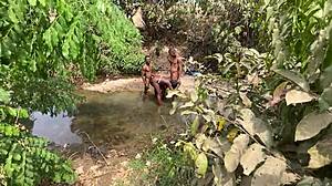 Steamy XXX with a curvaceous black beauty and a white companion in a public setting