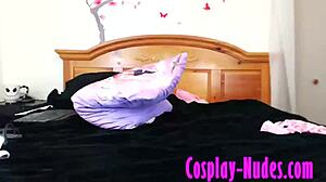 Young cosplay girl strips almost naked