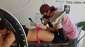 Tattoo session with fingering included by skilled artist