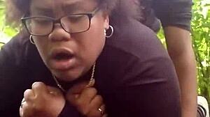 Young ebony woman enjoys outdoor activity in public