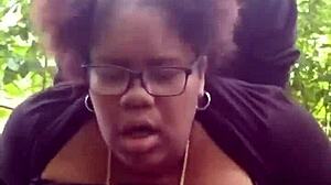 Young ebony woman enjoys outdoor activity in public