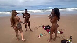 Couple enjoys beach time in front of friends