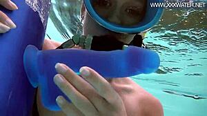 Minnie manga blows dildo underwater