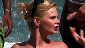 At the beach busty babe gets double penetrated by two hung strangers